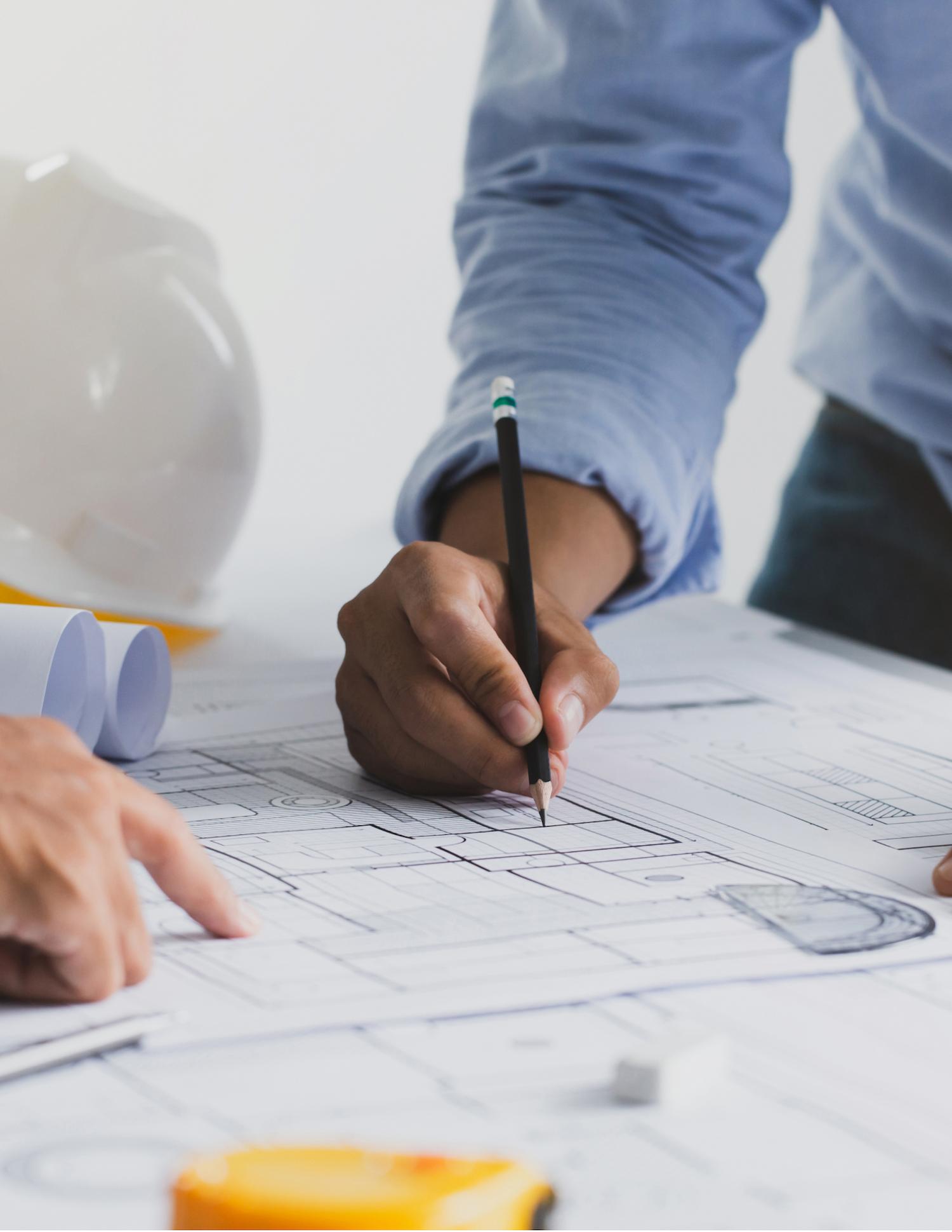 Hand writing on a blueprint